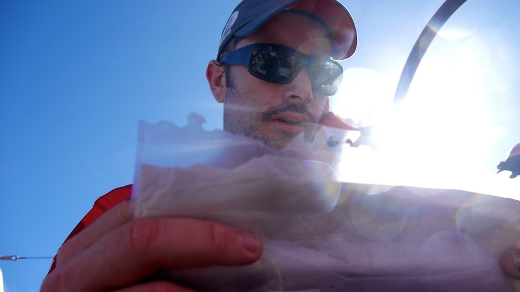 Adam  Minoprio checks the latest Skegs which are favourable onboard Camper with Emirates Team New Zealand during leg 1 of the Volvo Ocean Race 2011-12, from Alicante, Spain to Cape Town, South Africa.  © Hamish Hooper/Camper ETNZ/Volvo Ocean Race